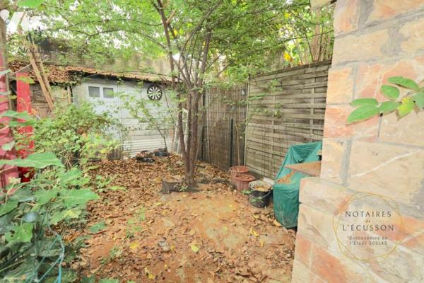 Appartement T2 avec mezzanine, jardinet et cave