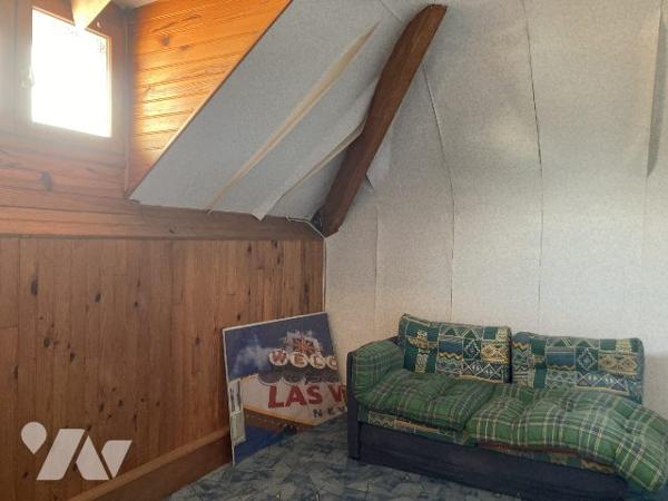 maison mitoyenne avec petit garage et jardin