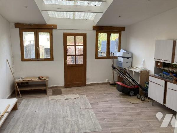 maison mitoyenne avec petit garage et jardin