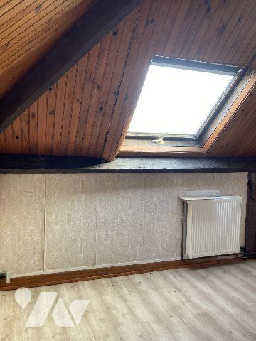 maison mitoyenne avec petit garage et jardin