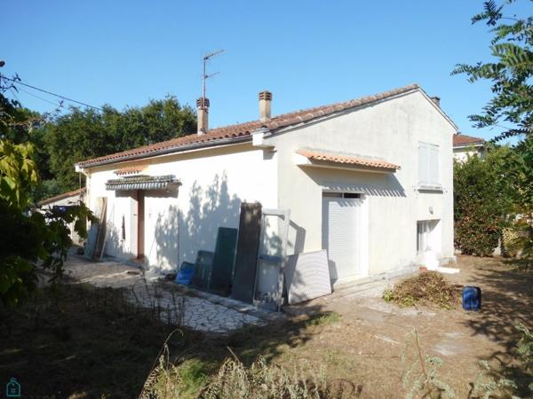 Maison centre ville dans une rue calme