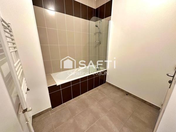 T3 balcon, parking couvert, cave à 500m de la gare