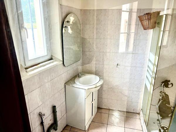 Immeuble de rapport avec cachet à rénover