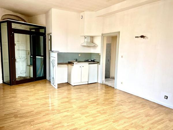 Immeuble de rapport avec cachet à rénover