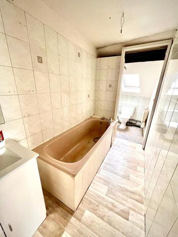 Immeuble de rapport avec cachet à rénover