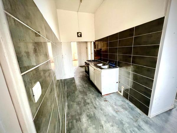 Immeuble de rapport avec cachet à rénover