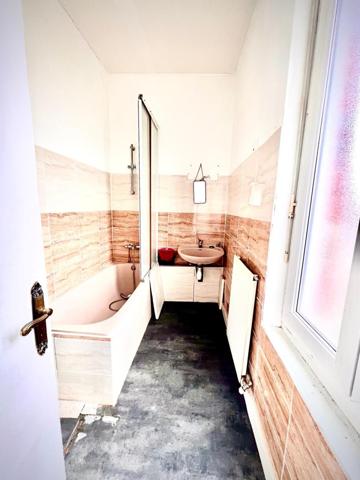 Immeuble de rapport avec cachet à rénover