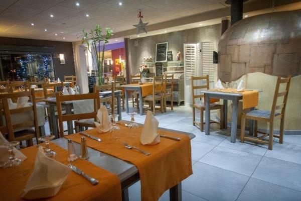 Fonds de commerce restaurant - grill - pizzeria sur secteur à forte fréquentation - Parking privé