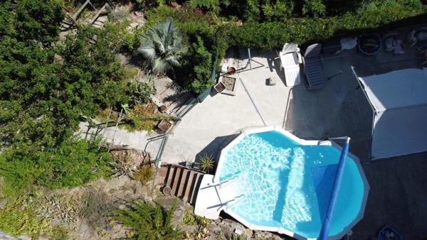 Grande maison de 260M², 7 chambres avec salle d'eau et wc, 2 cuisines, jardin et piscine hors sol