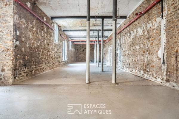 Loft brut à aménager avec terrasse et jardin