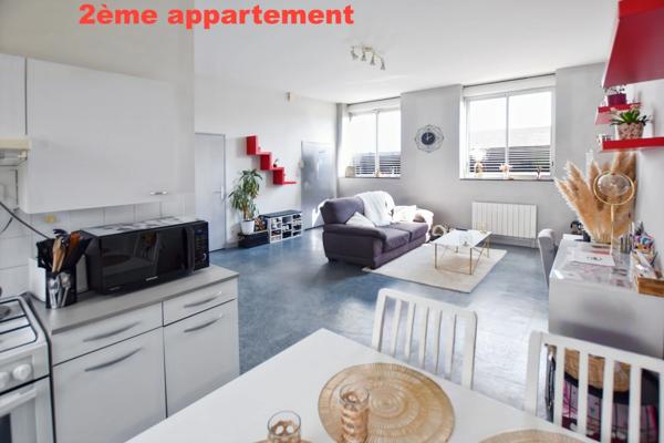 Maison d'habitation +deux appartements locatifs avec terrain de 2455 m2