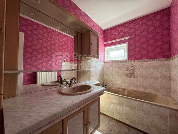 Semi-plain-pied 4 chambres - Maison familiale avec jardin et garage