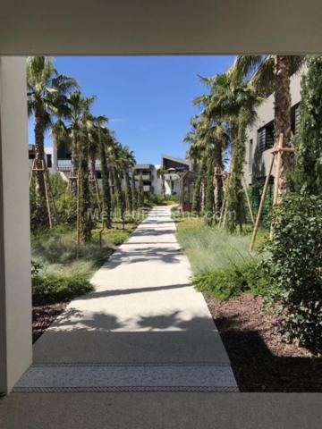 T4 neuf dans résidence standing avec piscine au centre de Lattes, vue sur le Lez et 3 stationnements