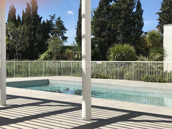 T4 neuf dans résidence standing avec piscine au centre de Lattes, vue sur le Lez et 3 stationnements