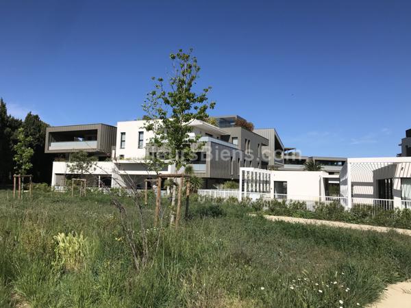 T4 neuf dans résidence standing avec piscine au centre de Lattes, vue sur le Lez et 3 stationnements