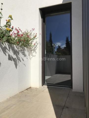 T4 neuf dans résidence standing avec piscine au centre de Lattes, vue sur le Lez et 3 stationnements