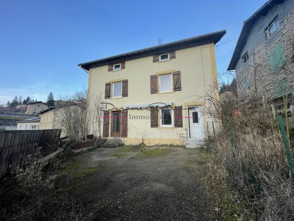 Maison à rénover avec terrain attenant.