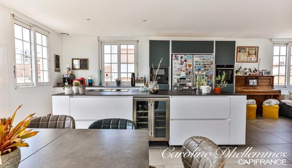 Maison de ville en plein coeur du quartier de la gare.