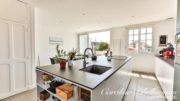 Maison de ville en plein coeur du quartier de la gare.