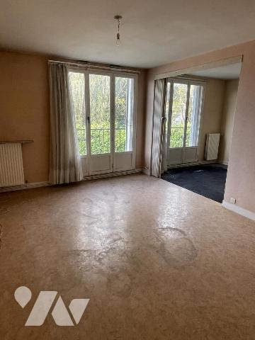 Appartement de type 3, une chambre, cave