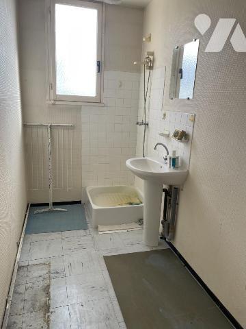 Appartement de type 3, une chambre, cave