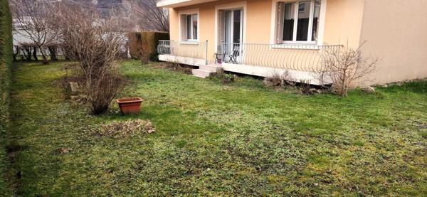 Appartement de charme en rez-de-chaussée avec jardin privatif et garage