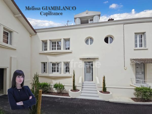 Maison de ville à vendre avec jardin et parking