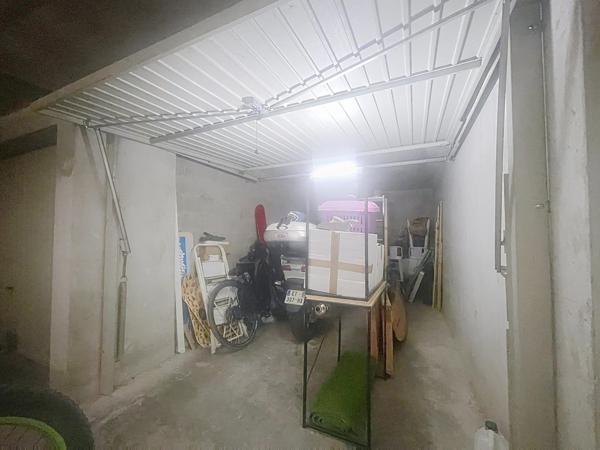 GARAGE FERME EN SOUS SOL
