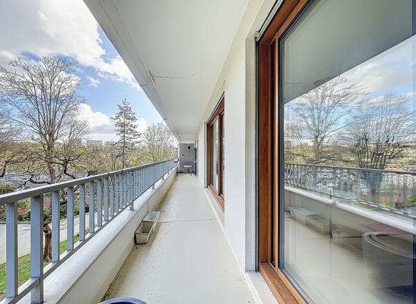 Appartement 5 pièces de 122.90 m² - Proche centre-ville