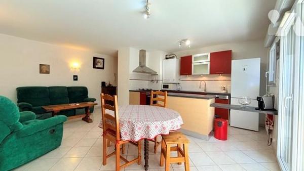 Appartement T3, cave et garage.