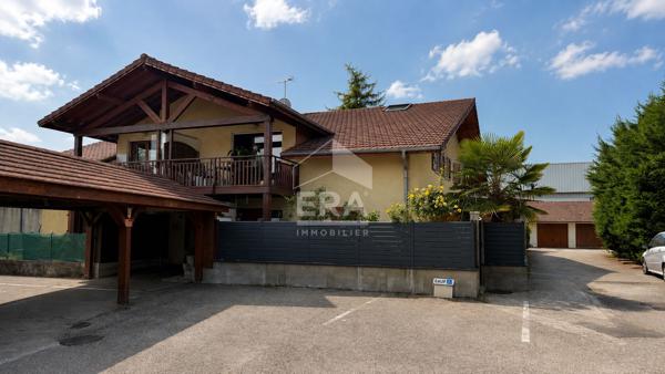 Appartement 4 chambres + garage + places de parking privatives