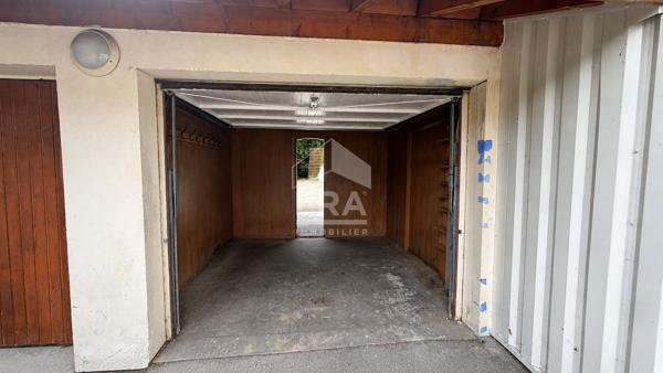 Appartement 4 chambres + garage + places de parking privatives