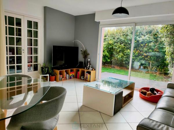 Duplex 2 chambres, jardinet, balcon et garage