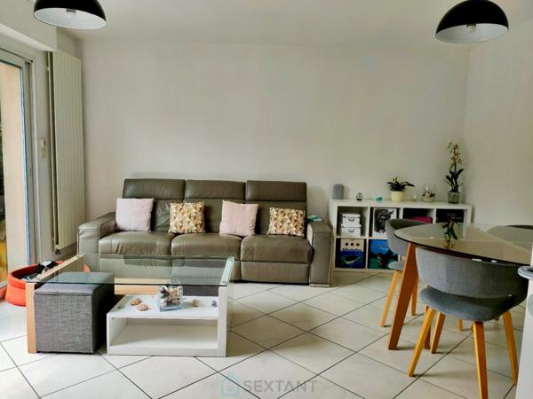 Duplex 2 chambres, jardinet, balcon et garage