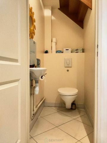 Duplex 2 chambres, jardinet, balcon et garage