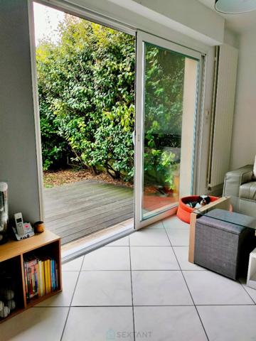 Duplex 2 chambres, jardinet, balcon et garage