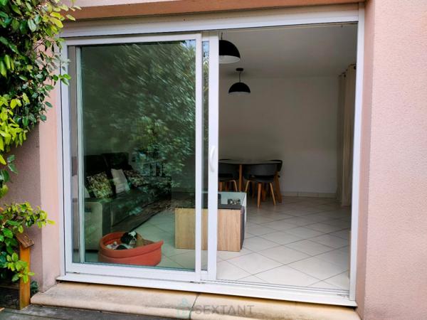 Duplex 2 chambres, jardinet, balcon et garage