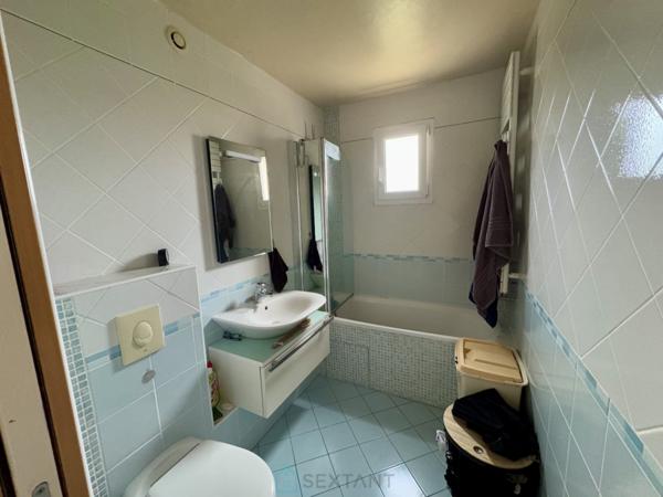 Duplex 2 chambres, jardinet, balcon et garage