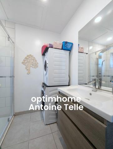 Maison semi-individuelle avec grand garage & jardin clos