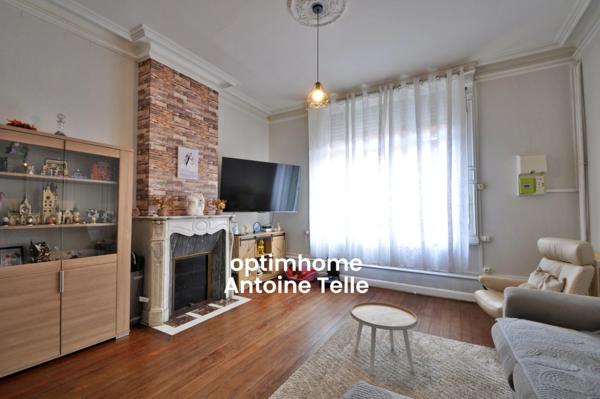 Maison semi-individuelle avec grand garage & jardin clos