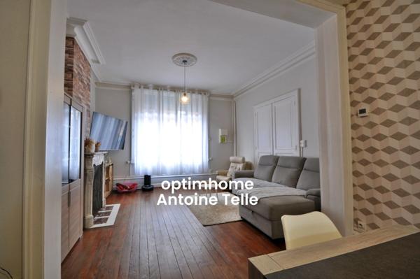 Maison semi-individuelle avec grand garage & jardin clos