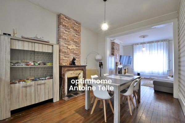 Maison semi-individuelle avec grand garage & jardin clos