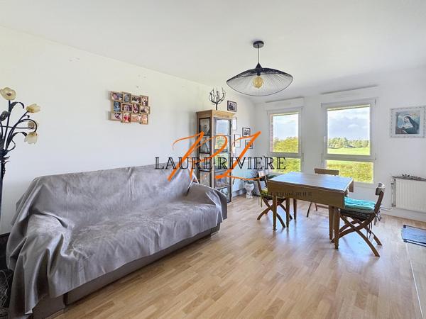 Studio lumineux de 34,42 m² balcon et vue dégagée – parking et cave