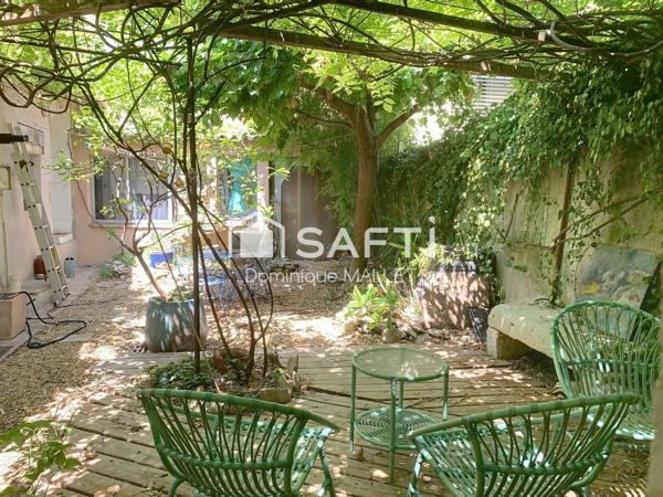 Maison atypique avec jardin au calme en ville