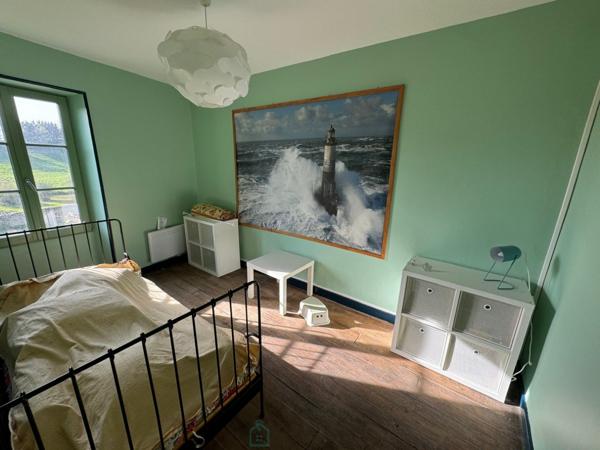 Maison de centre bourg en bord de rivière