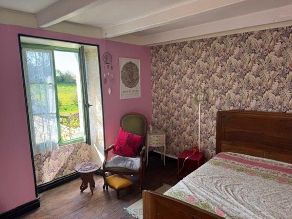 Maison de centre bourg en bord de rivière