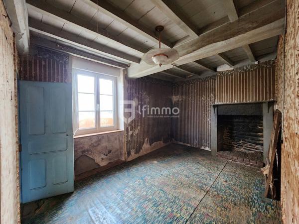 Maison à rénover avec un beau potentiel
