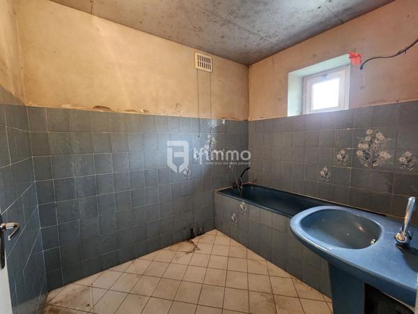 Maison à rénover avec un beau potentiel