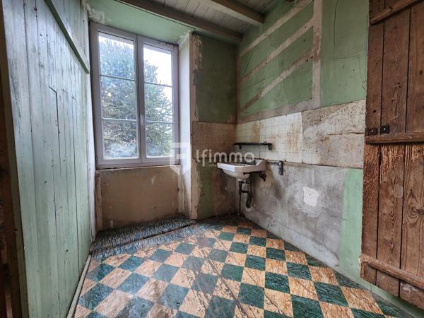 Maison à rénover avec un beau potentiel