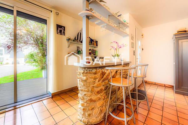 Environnement paisible et charmant pour ce pavillon coeur de ville